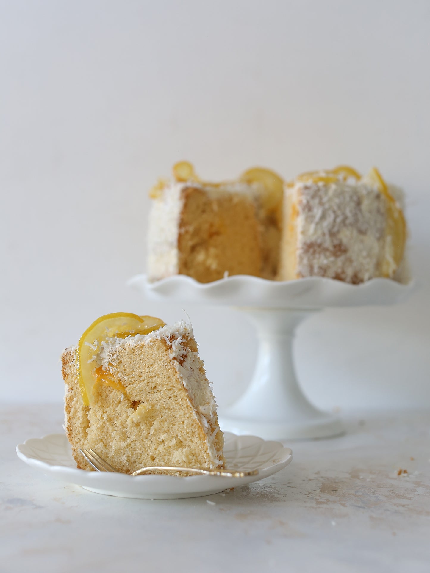 8" Coco Citrus Chiffon, Lemon Curd, Vanilla Crème, Desiccated Coconut